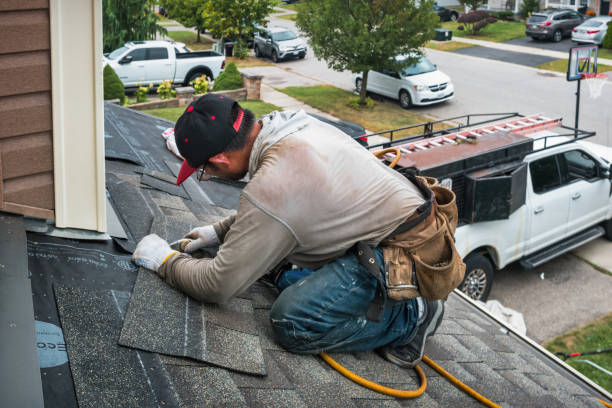 Professional Roof Replacement technician working in Milan, IL